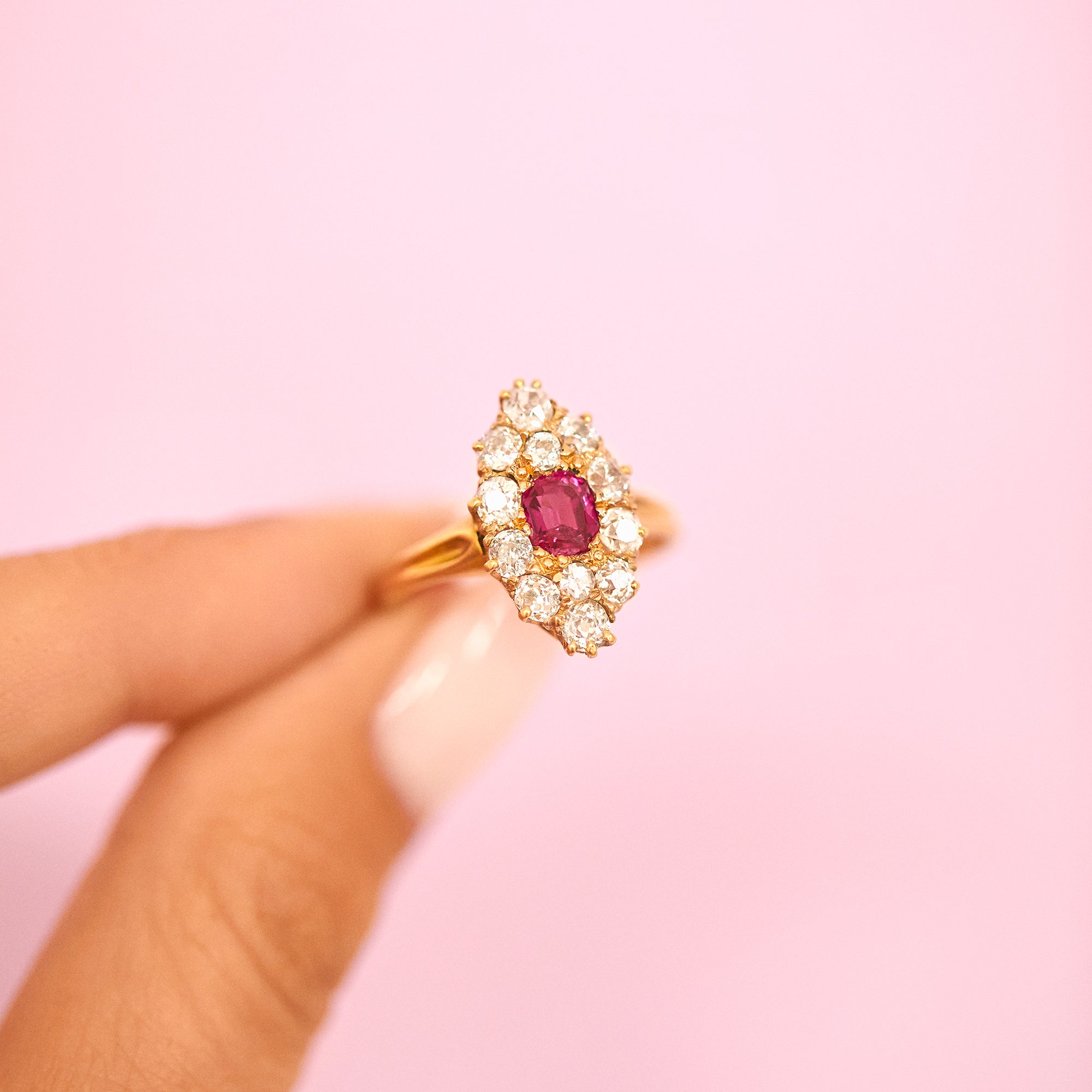 18ct gold ring set with a ruby and a diamonds