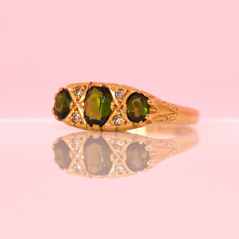 18ct gold ring set with green tourmaline and diamonds