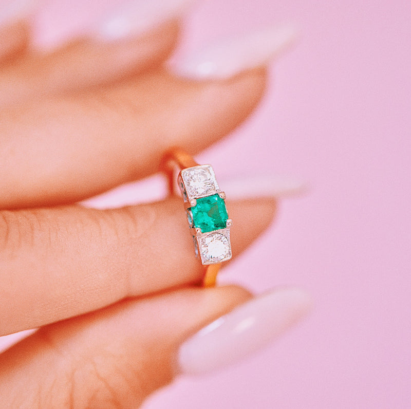18ct gold emerald and diamond three stone ring