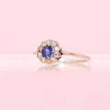 Platinum sapphire and diamond flower ring