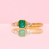 18ct gold emerald and diamond three stone ring