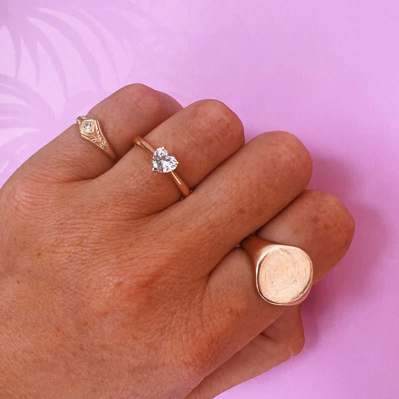 18ct gold ring set with a 0.48ct heart shaped diamond