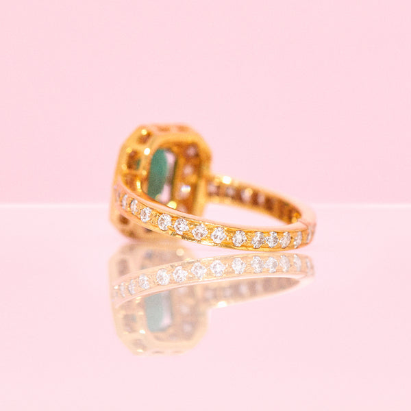 18ct gold emerald and diamond full eternity ring