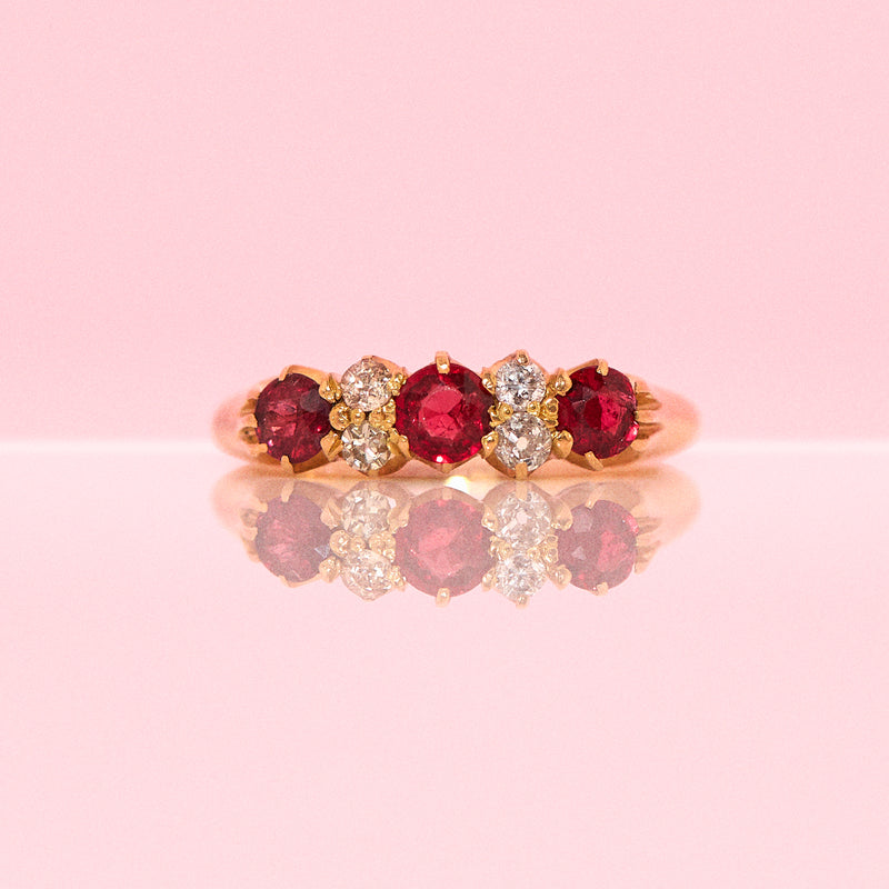 18ct gold ruby and diamond seven stone ring