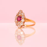 18ct gold ring set with a ruby and a diamonds