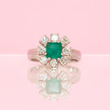 18ct white gold emerald and diamond cluster ring