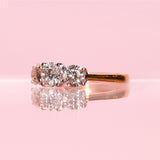 18ct gold ring set with a diamond trilogy