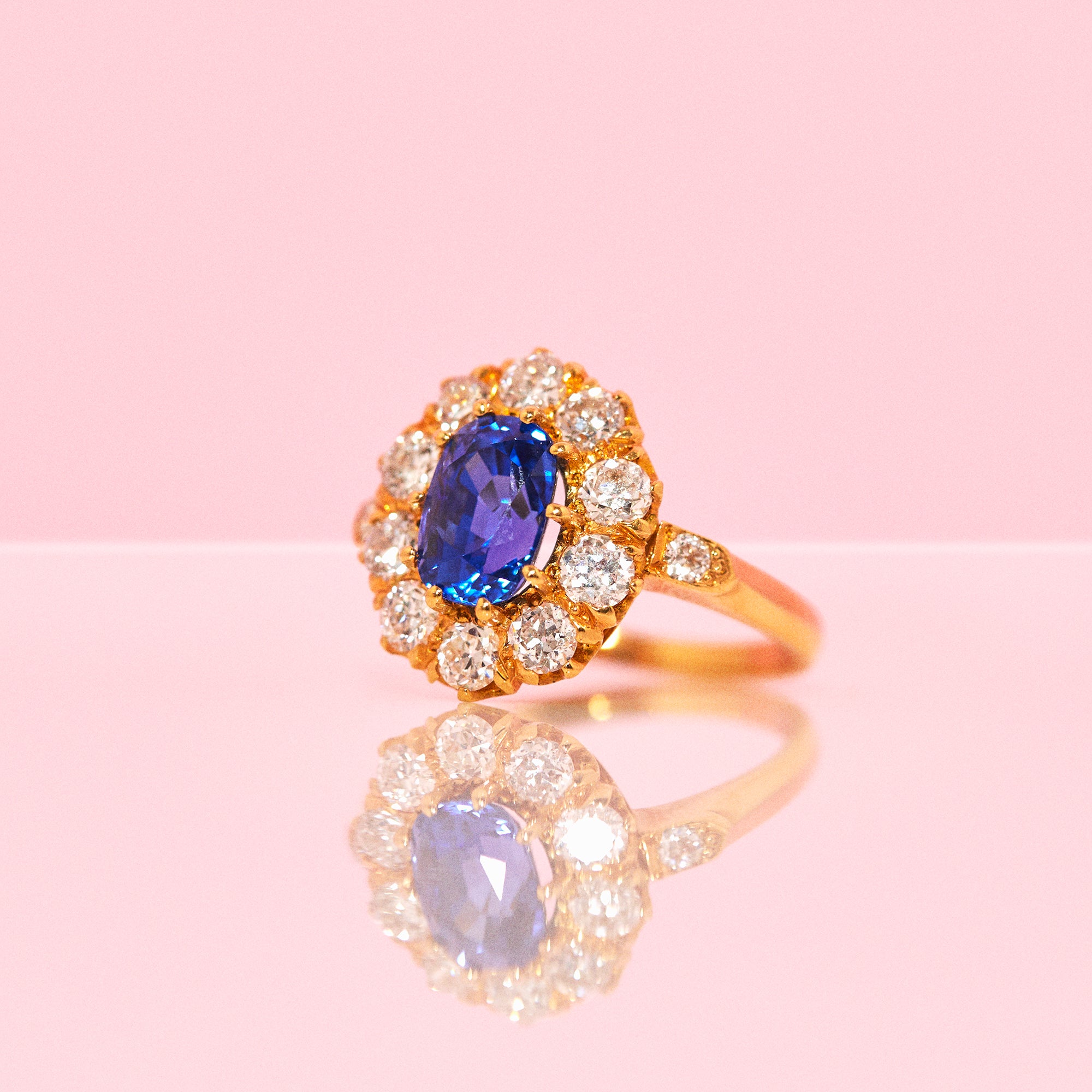 18ct gold sapphire and diamond cluster ring