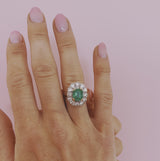 18ct gold emerald and diamond cluster ring