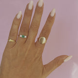 18ct gold emerald and diamond three stone ring