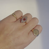 18ct gold ring set with a ruby and a diamonds