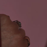 Platinum emerald and diamond flower ring