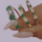 18ct gold emerald and diamond half eternity ring
