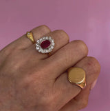 18ct gold ruby and a diamond cluster ring