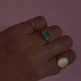 Platinum emerald and diamond three stone ring