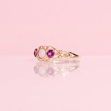 9ct gold ring set with an opal and amethysts