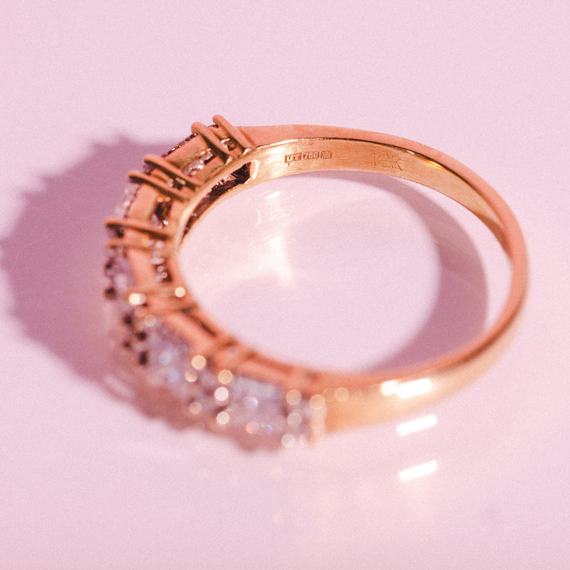 18ct gold half eternity ring with princess cut diamonds