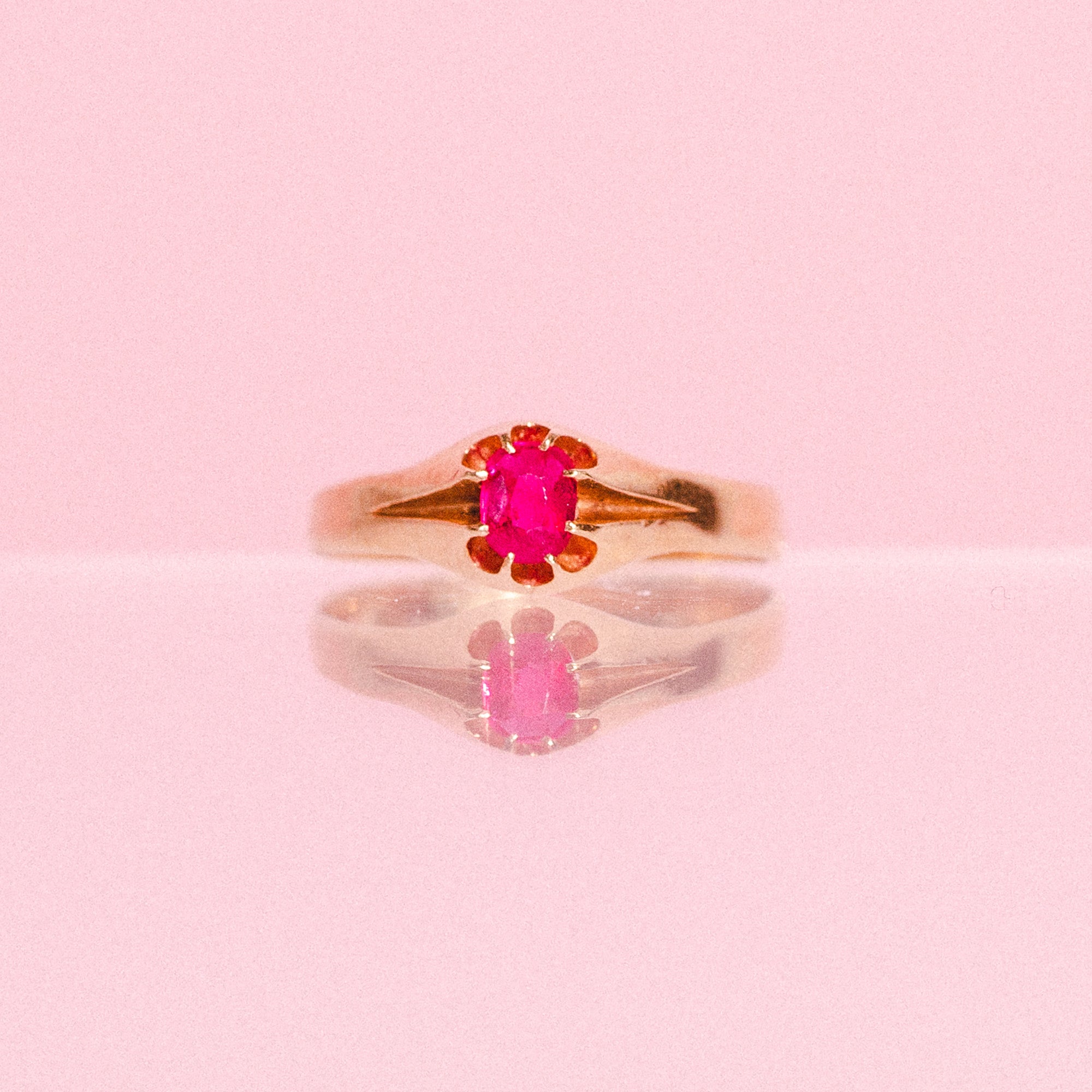 18ct gold ring set with one ruby