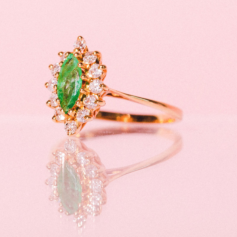 18ct gold marquise cut emerald and diamond ring