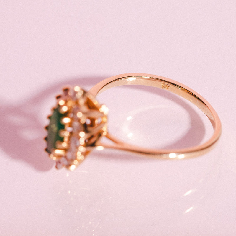 18ct gold marquise cut emerald and diamond ring