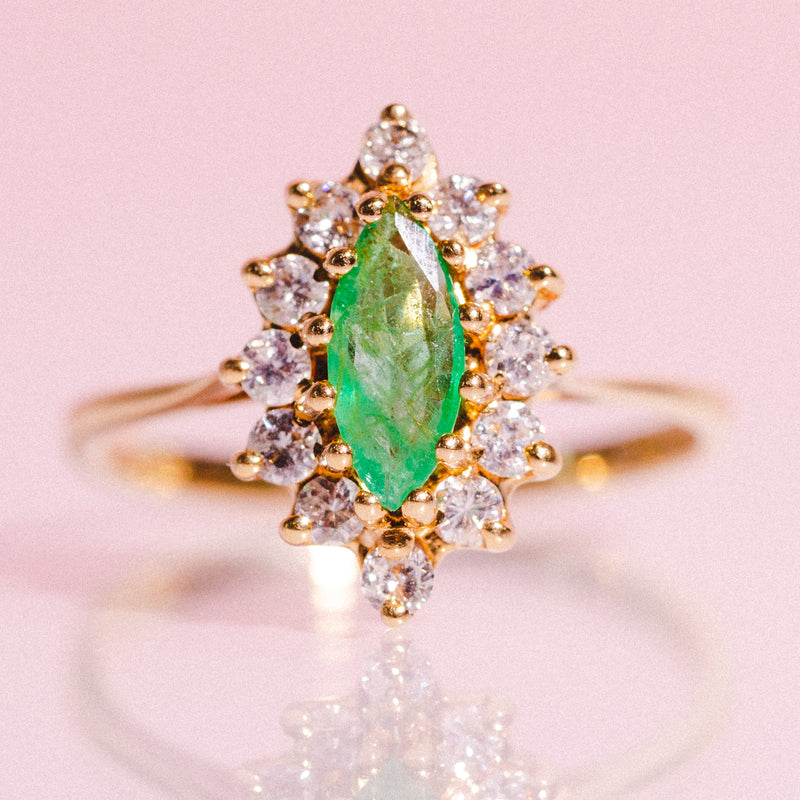 18ct gold marquise cut emerald and diamond ring