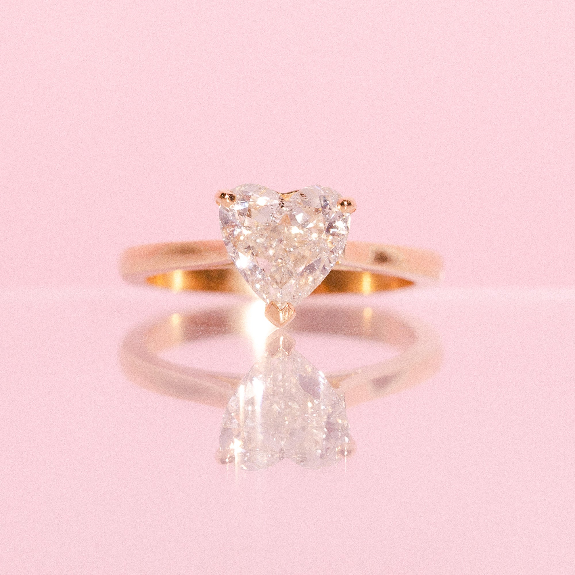 18ct gold ring set with a heart shaped diamond