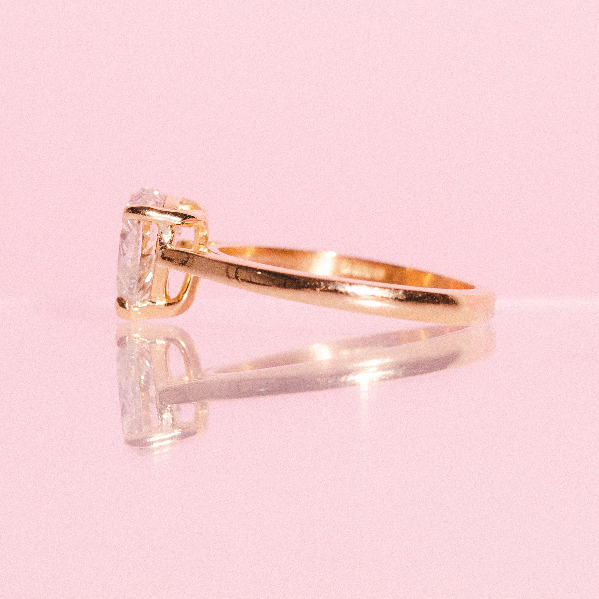 18ct gold ring set with a heart shaped diamond