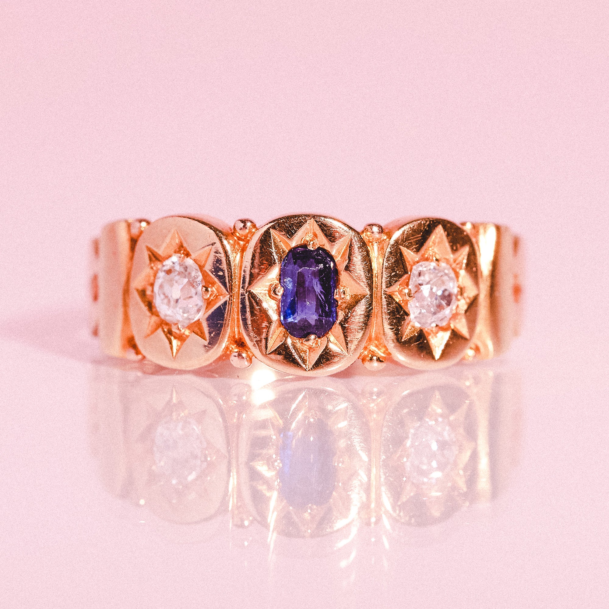 18ct gold ring set with a sapphire and diamonds