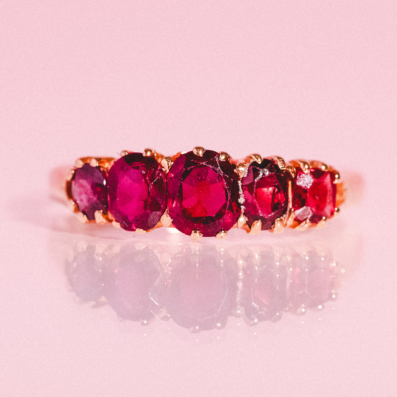 14ct gold ring set with five garnets