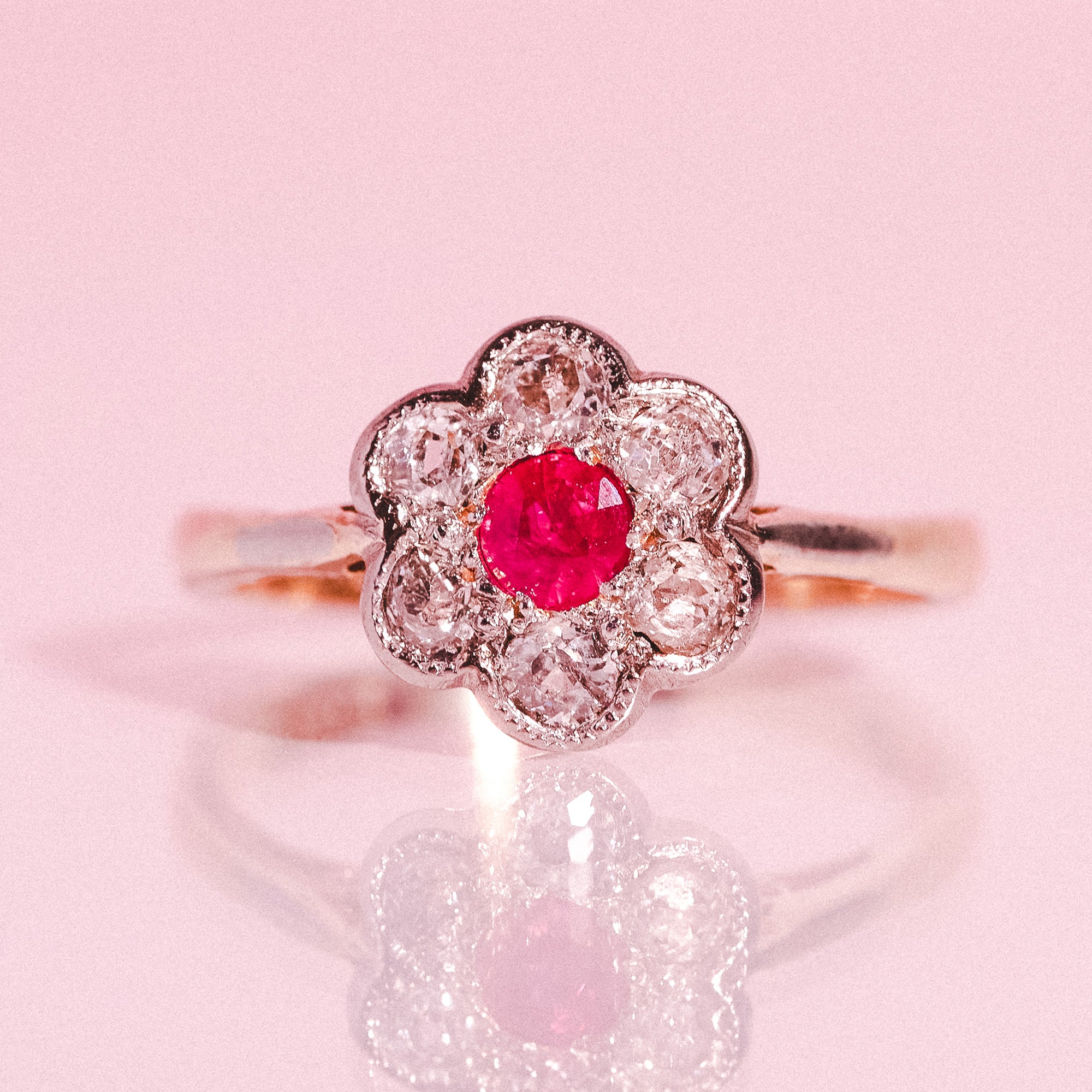 18ct gold ruby and diamond flower ring