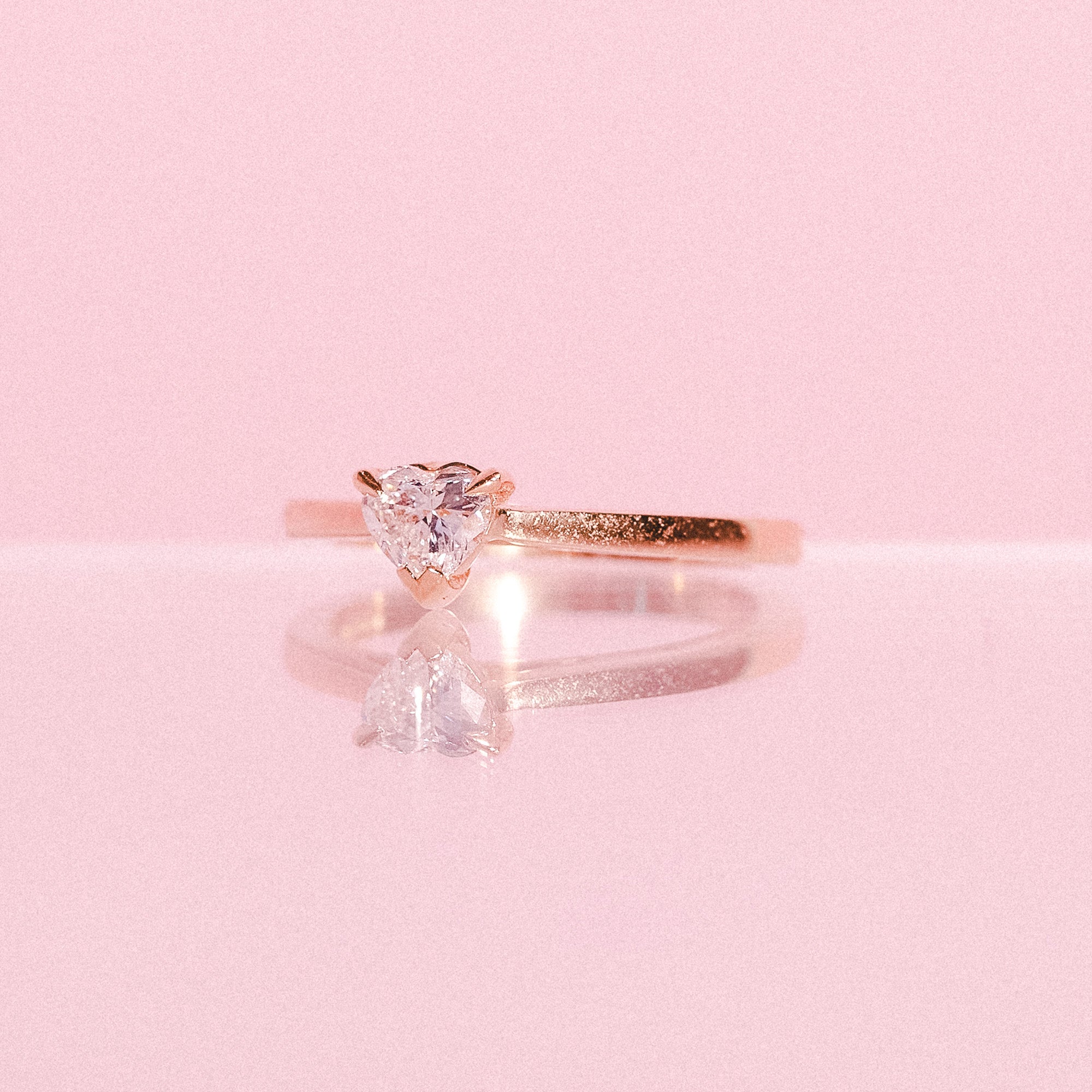 18ct gold ring set with a heart shaped diamond