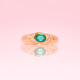 18ct gold ring set with a Colombian emerald and diamonds
