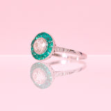 18ct gold Art Deco ring set with emeralds and a diamond