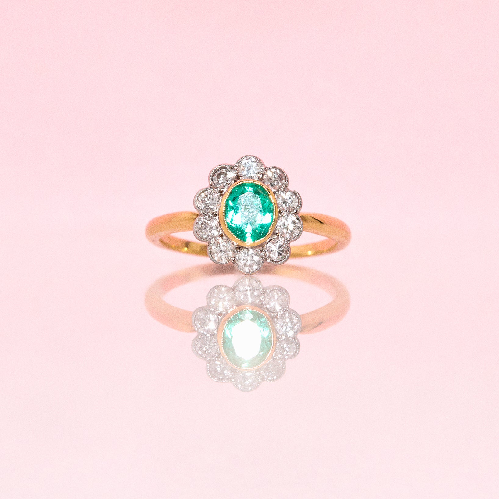 18ct gold emerald and diamond ring