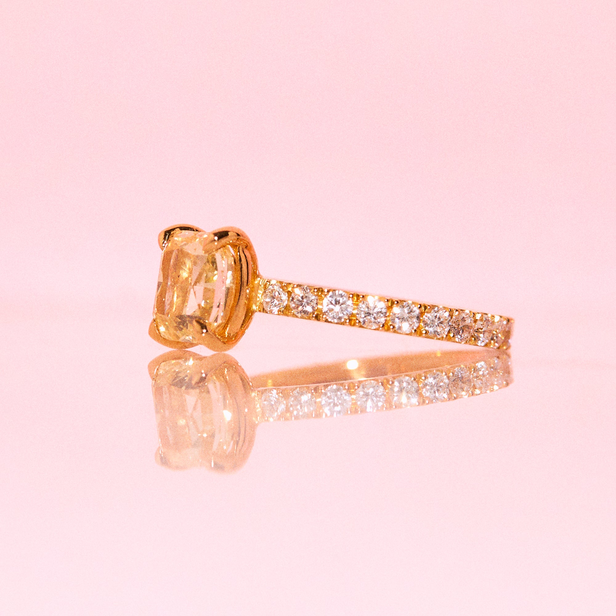 18ct gold yellow diamond ring on a full diamond eternity band