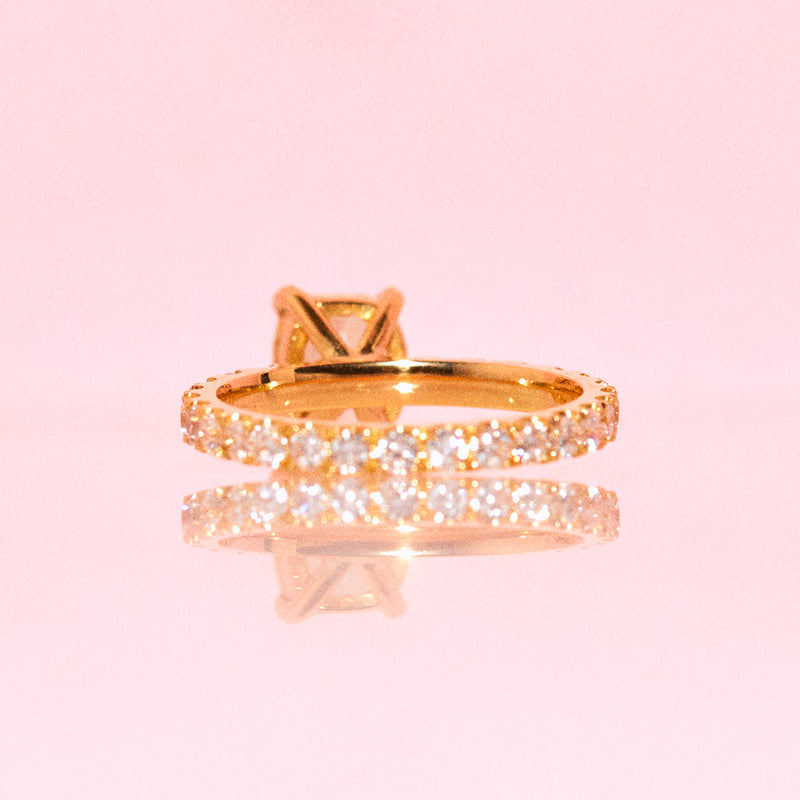 18ct gold yellow diamond ring on a full diamond eternity band