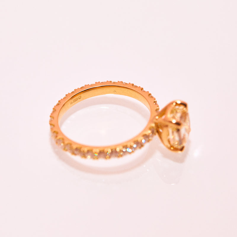 18ct gold yellow diamond ring on a full diamond eternity band