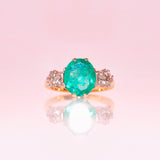 18ct gold ring set with an emerald and diamonds