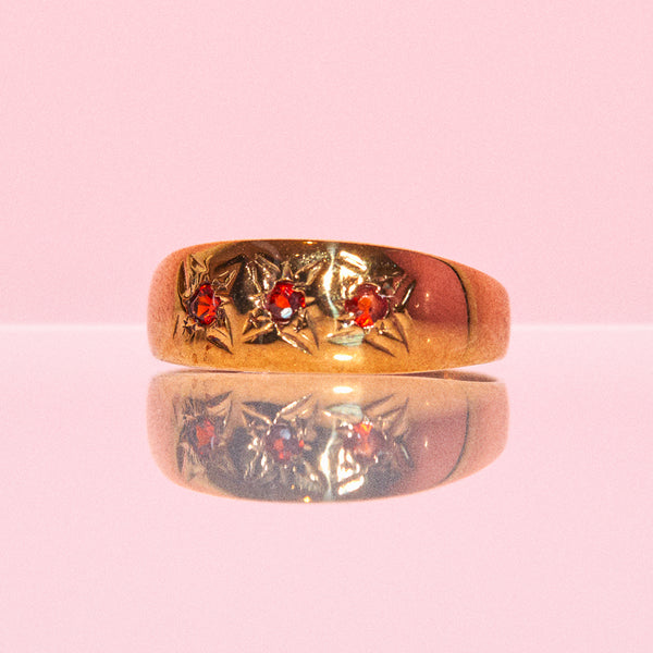 9ct gold gypsy ring set with three garnets