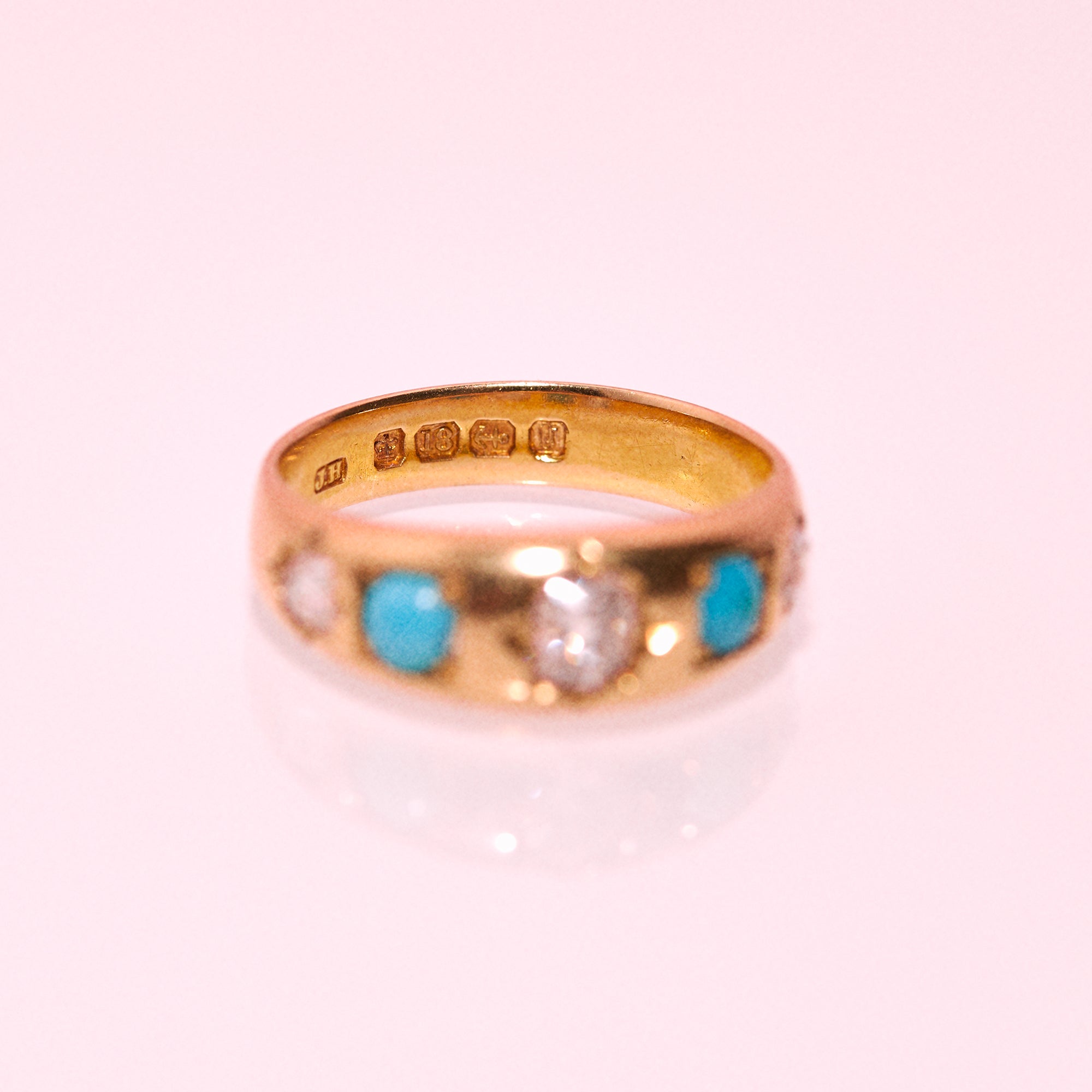 18ct gold diamond and turquoise gypsy ring from 1895