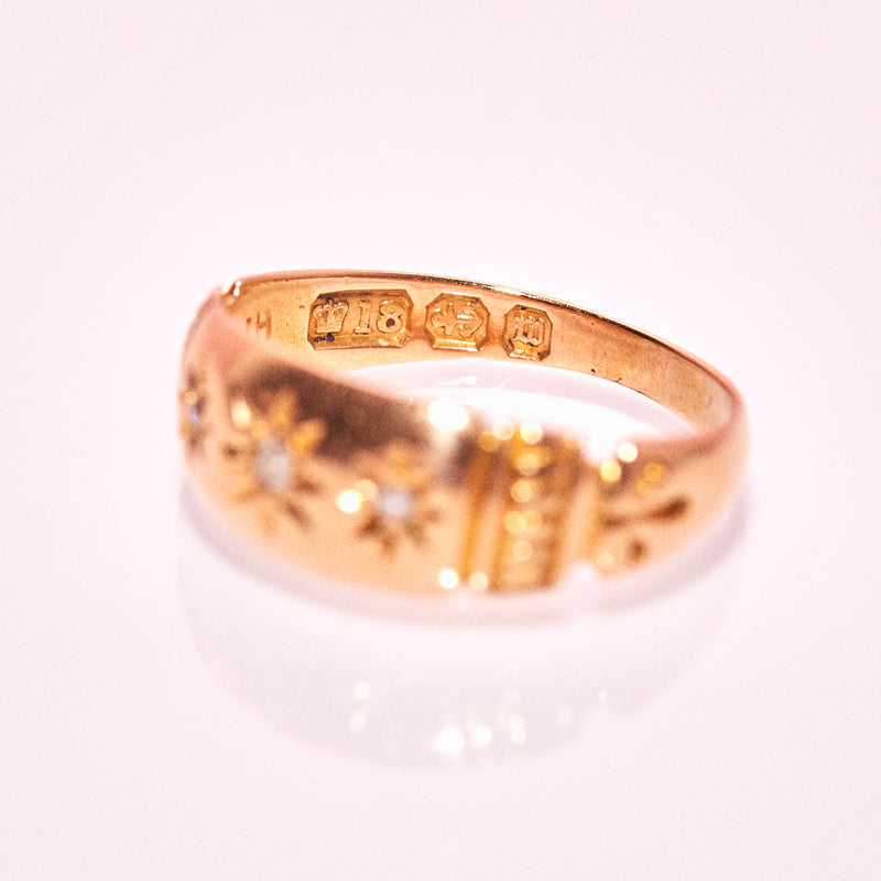 18ct gold gypsy ring set with diamonds