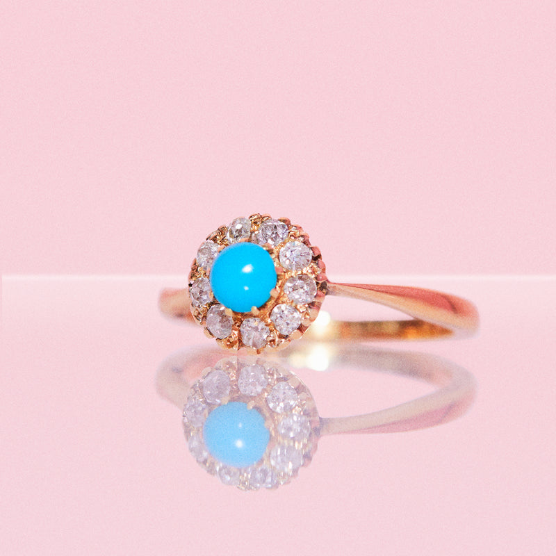 18ct gold ring set with a turquoise and diamonds