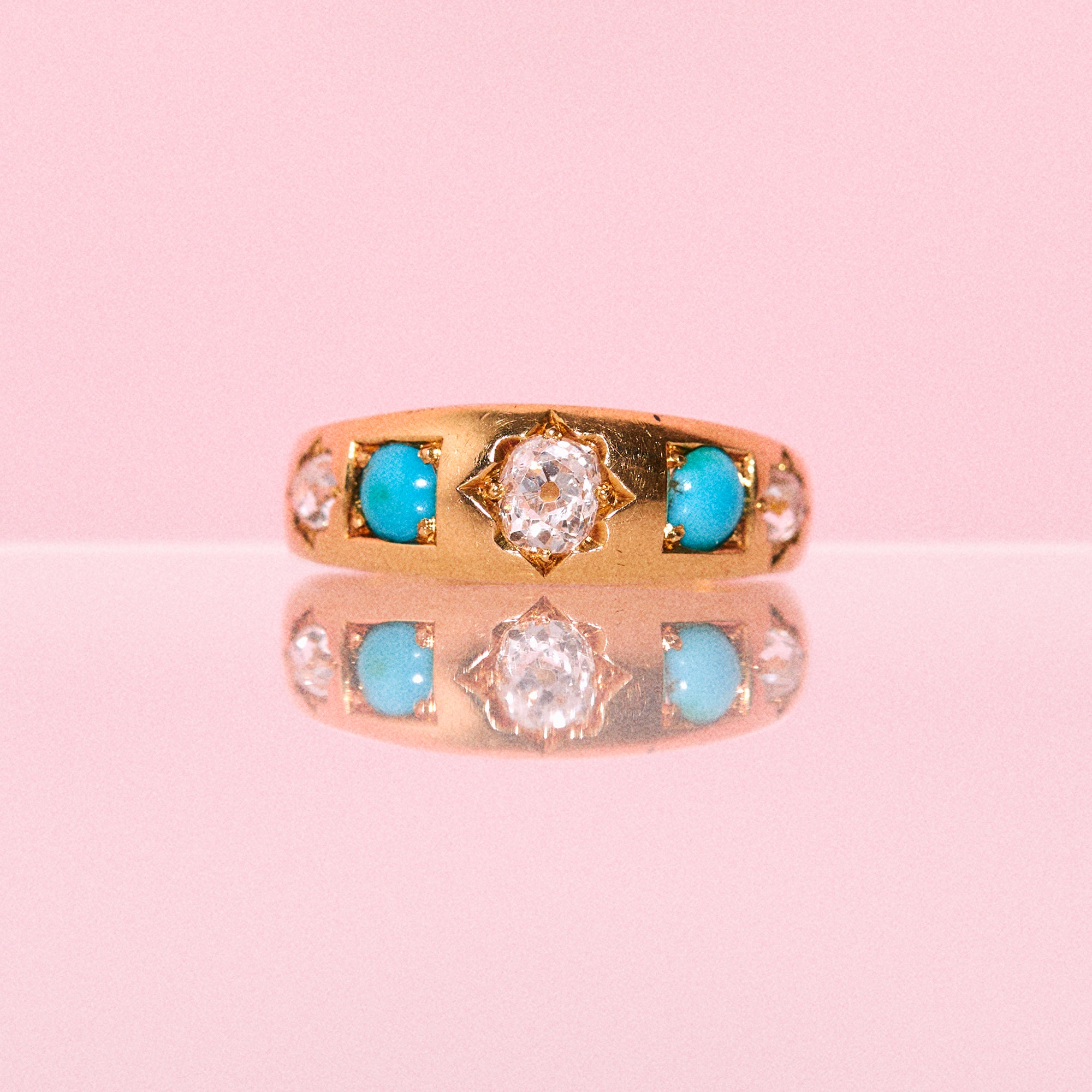 18ct gold diamond and turquoise gypsy ring from 1895