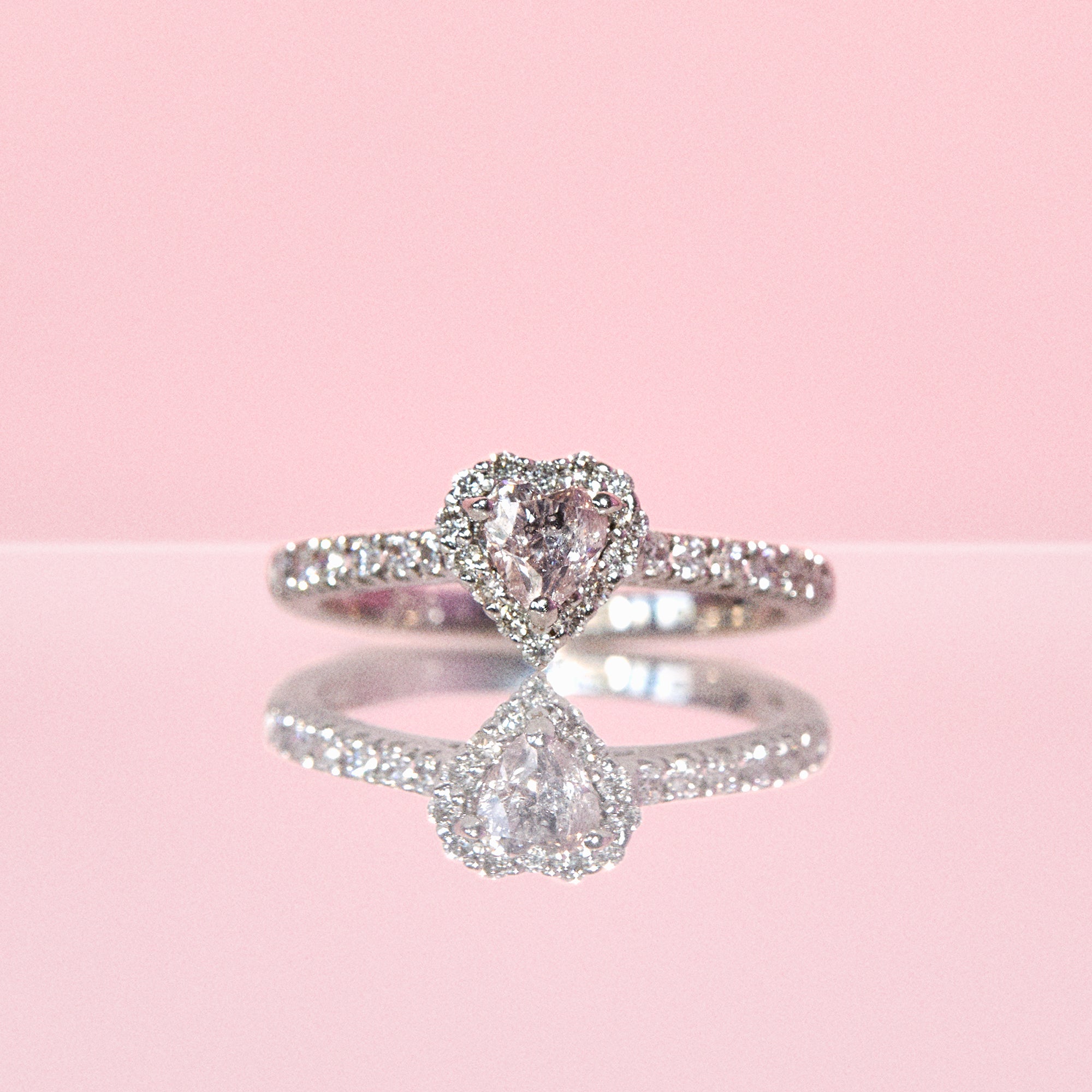 Platinum heart shaped pink diamond ring