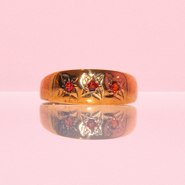 9ct gold gypsy ring set with three garnets