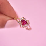 10ct gold ring set with a ruby and cubic zirconia