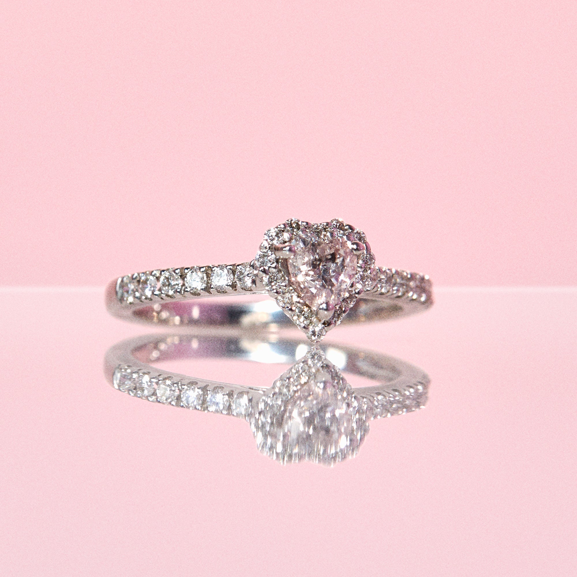 Platinum heart shaped pink diamond ring