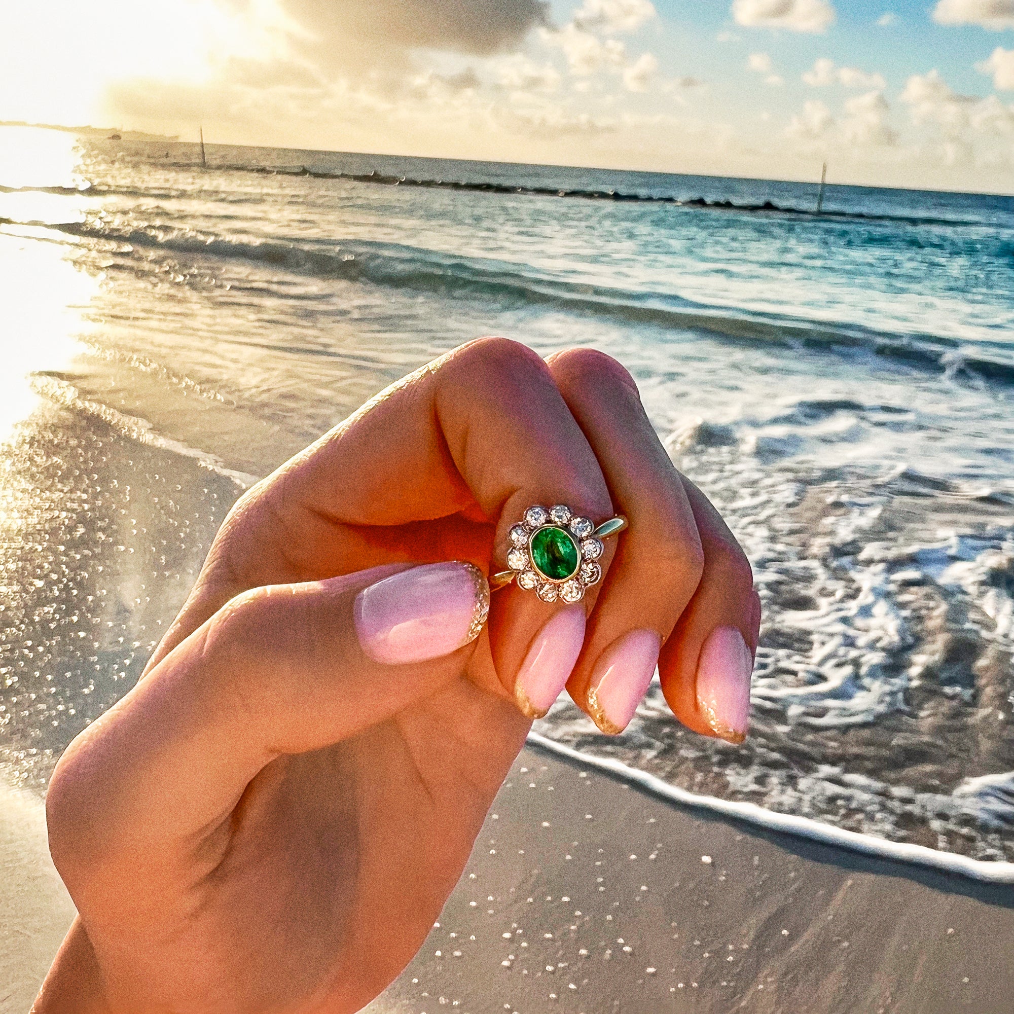 18ct gold emerald and diamond ring