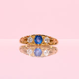 9ct gold ring set with a sapphire and diamonds