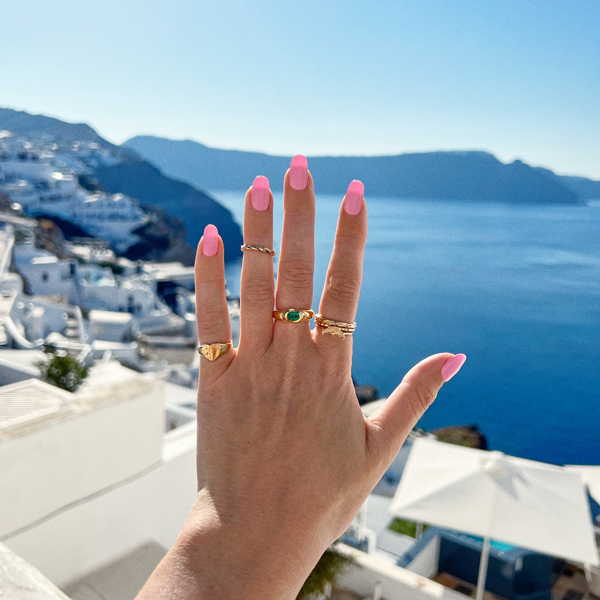 18ct gold ring set with a Colombian emerald and diamonds